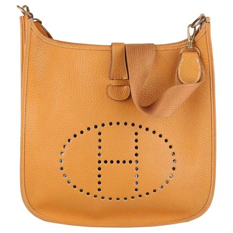 hermes tan evelyne shoulder bag|Hermes evelyne bag cost.